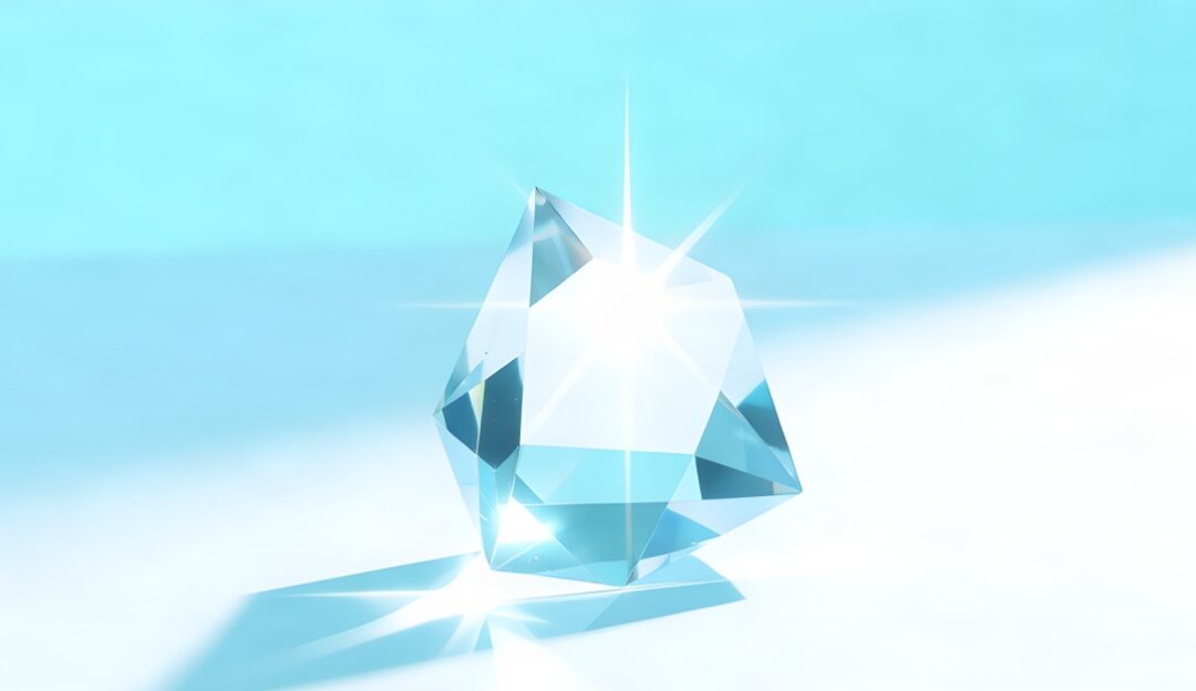 Faceted clear crystal prism refracting bright sunlight with a luminous lens flare against a soft blue and white background.